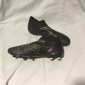 Puma Black Soccer Cleats with Neon Yellow Accents